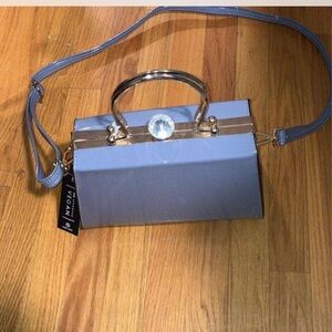 Elegant Gray Handbag with Gold Accents